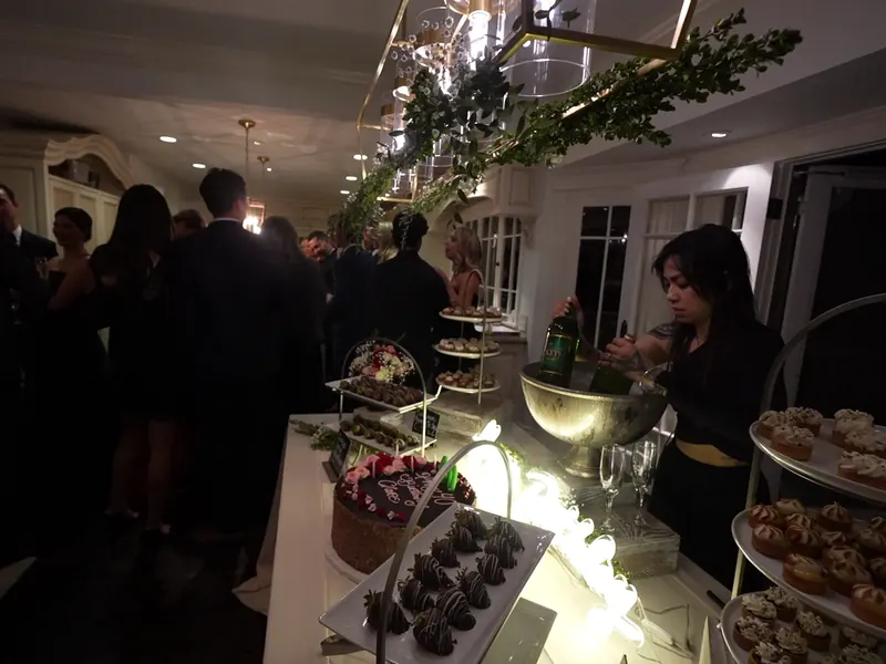 Dessert service in the lounge at the close of a Los Altos party