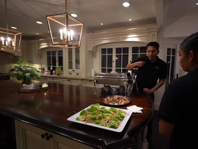 Chef plating platters in the kitchen before a Morgan Hill dinner