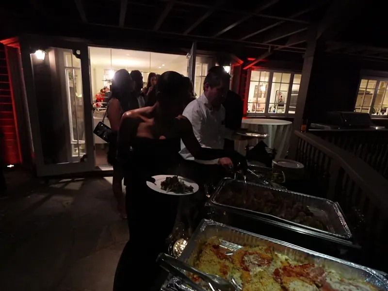 Hot entrée chafers lined up for a Cupertino office buffet