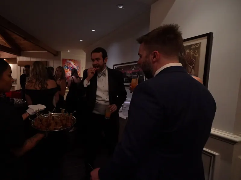 Cocktail hour with drinks and bites at a Saratoga home celebration